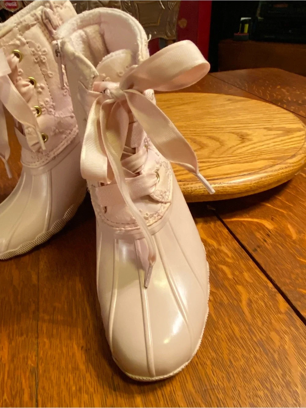 Sperry Girls powder pink lace-up all weather duck boots.